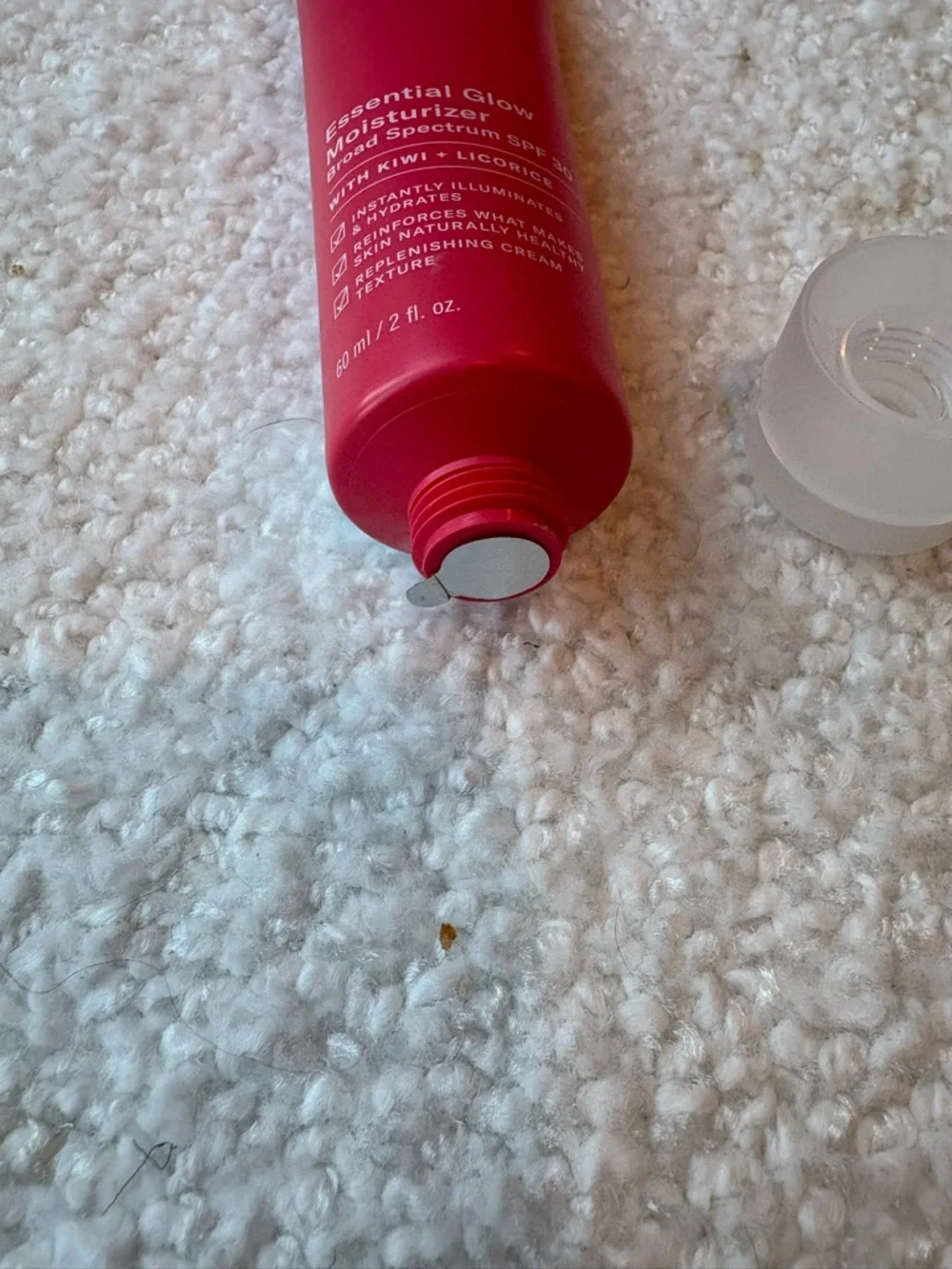 Paula's Choice Essential Glow Moisturizer Tube in Red and Clear
